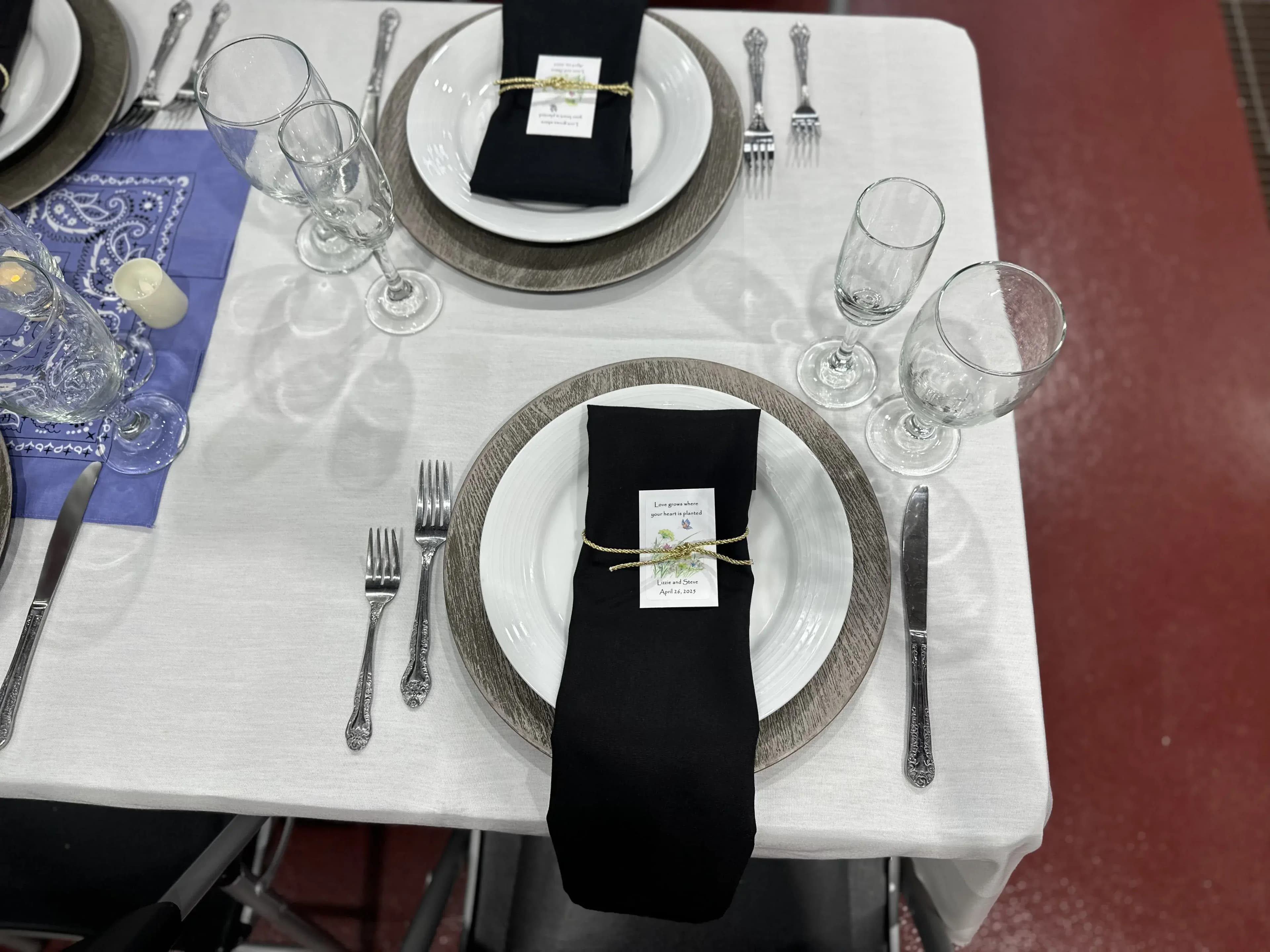 Elegant place setting with black napkin