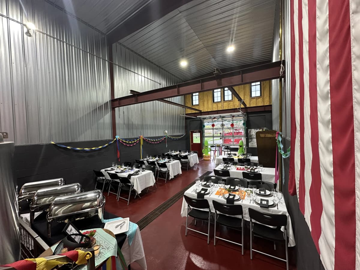 Offsite catering event setup with American flag